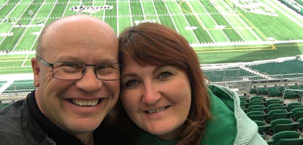 ﻿Sherri and her husband, Conrad, at the Mosaic Stadium Open House.